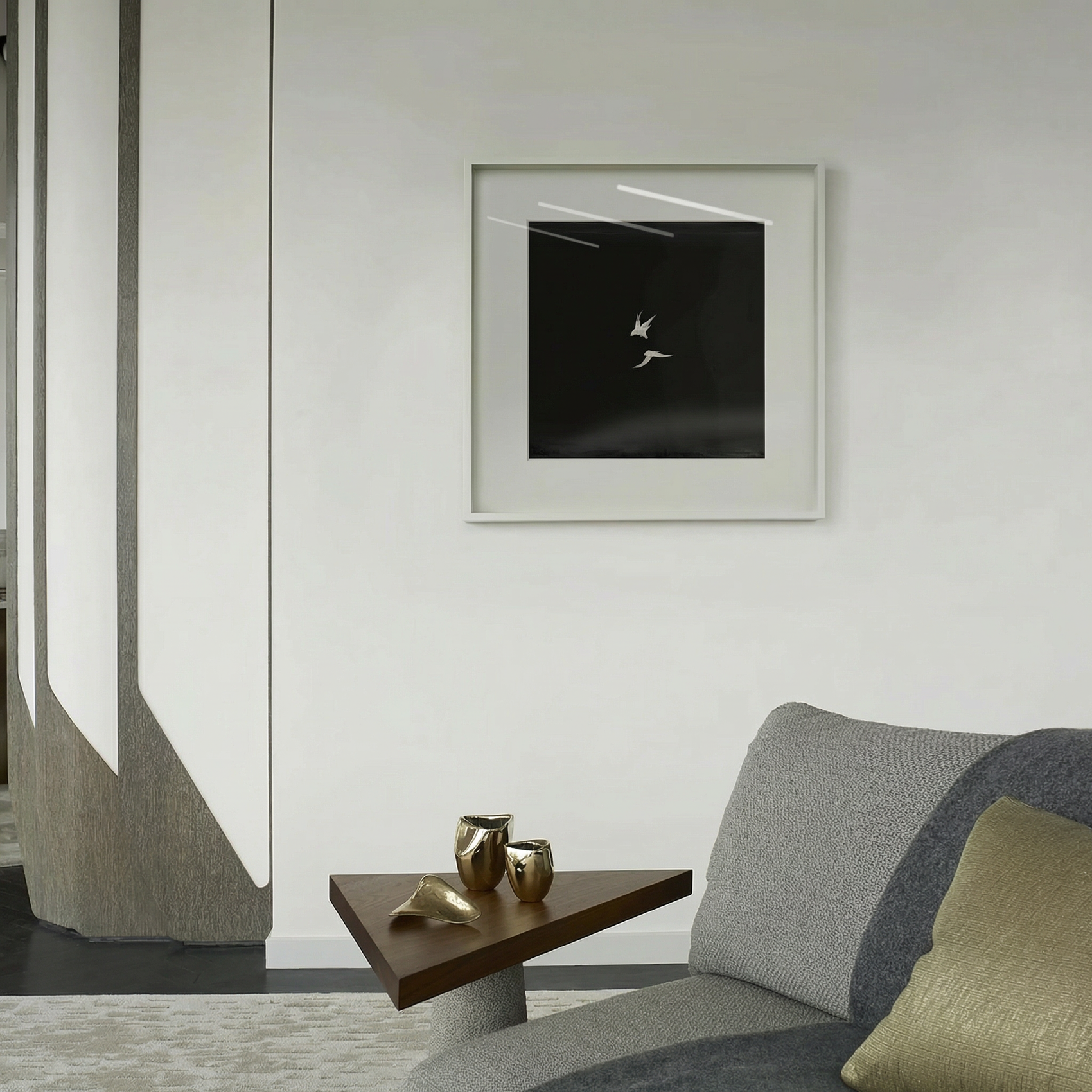 Modern living room with a gray sofa, wooden side table, and framed black and white artwork. Bird 2 – Elegant Nature Canvas Print | Luxury Wall Art | Brume Art