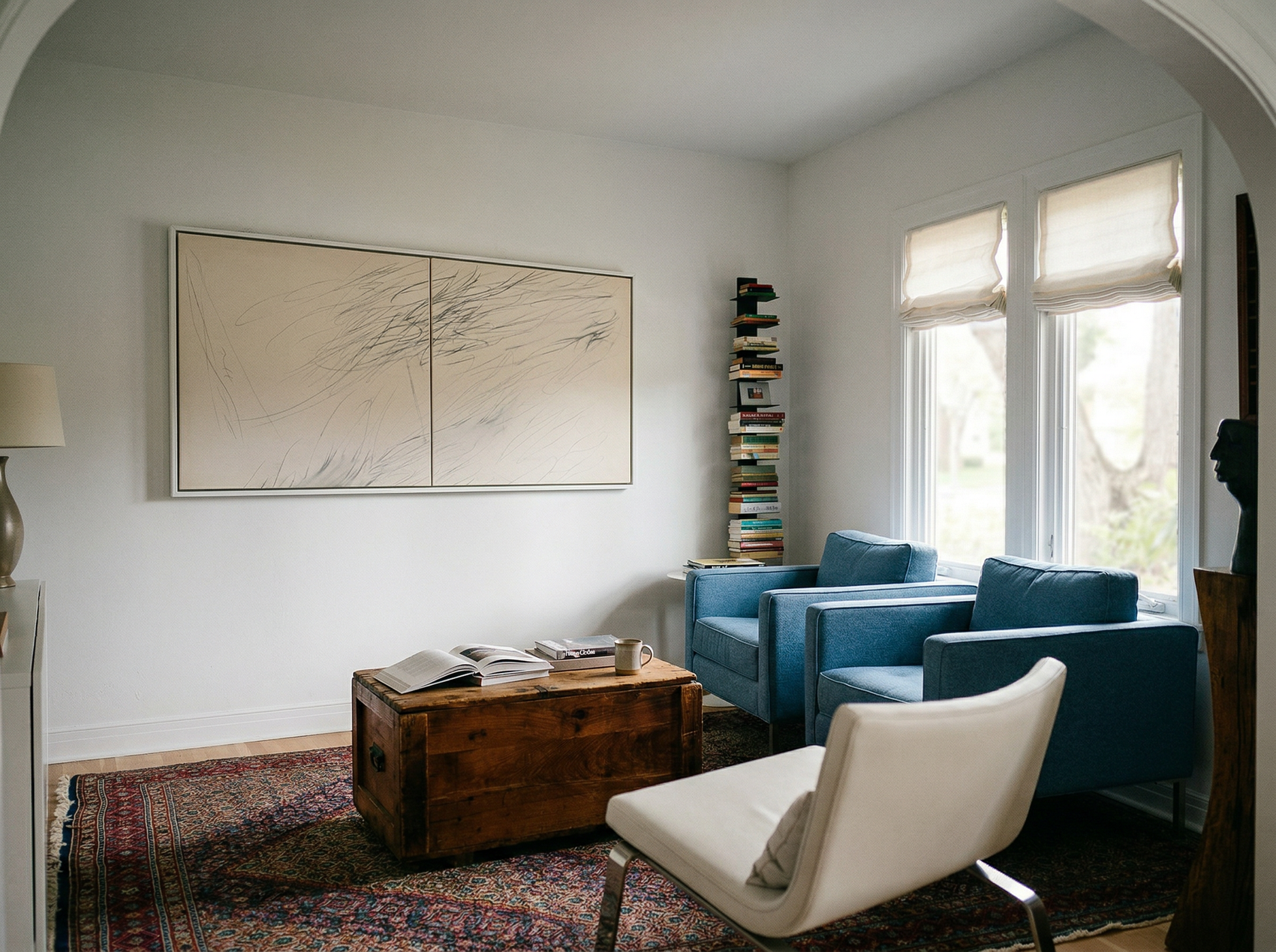 Modern living room with blue sofa, white armchair, and wooden coffee table. Black lines – Bold Abstract Canvas Print | Large Luxury Wall Art