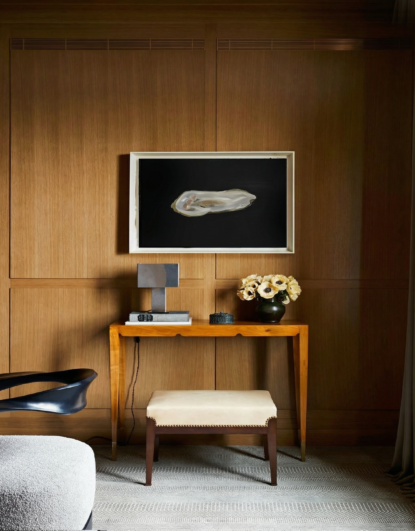 Wooden console table with a vase of flowers against a wooden wall. Pearl 2 – Elegant Abstract Canvas Wall Art | Luxury Giclée Print | Brume Art| Luxury Wall Decor | Large Canvas Wall Art | Oversized Wall Hanging-Brume art