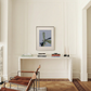 Modern interior with a console table, chairs, and artwork on a white wall. Orchid – Botanical Canvas Wall Art | Large Luxury Print | Brume Art