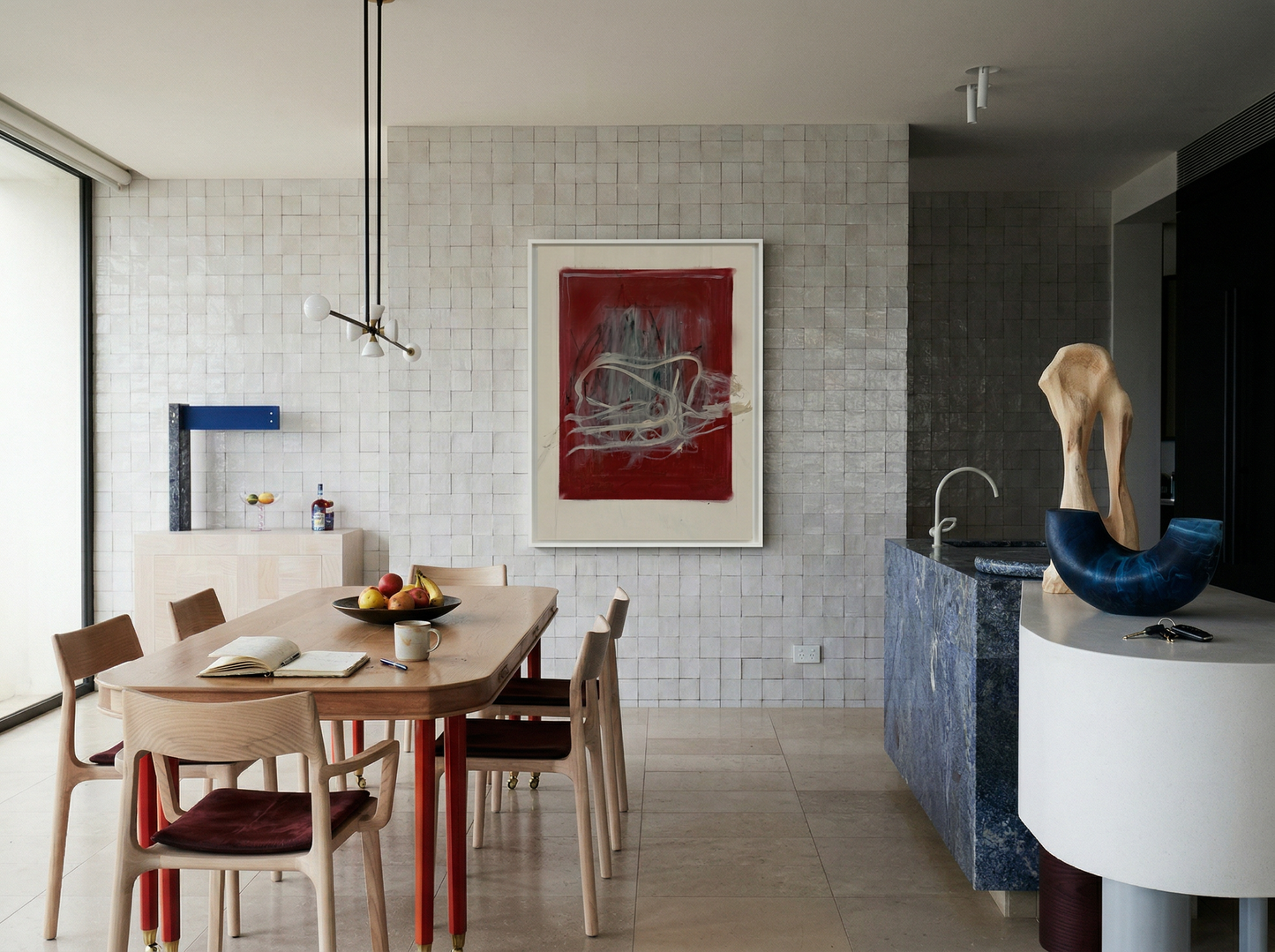 Modern kitchen with a dining area and a sculpture on a white counter. Tension – Bold Abstract Canvas Print | Large Luxury Wall Art | Brume Art
