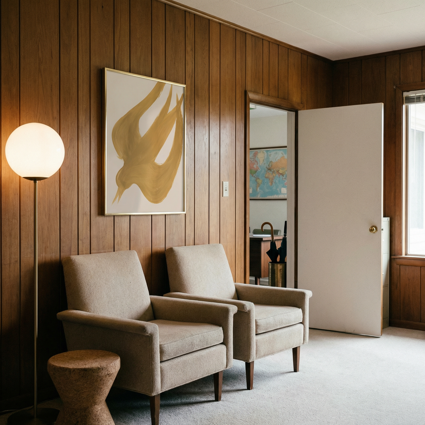 Two beige armchairs in a room with wooden paneling, a lamp, and a door. Golden Bird – Elegant Nature Canvas Print | Luxury Wall Art | Brume Art