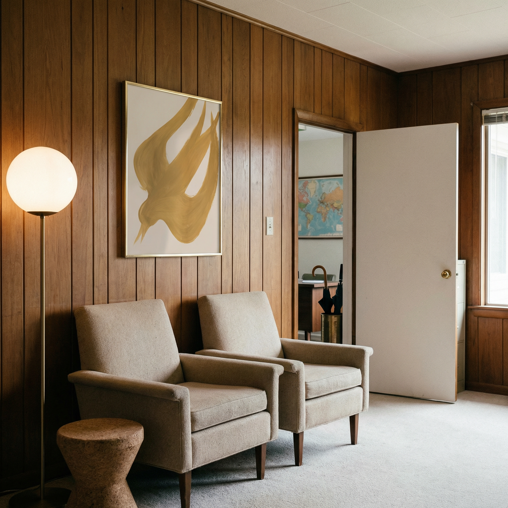Two beige armchairs in a room with wooden paneling, a lamp, and a door. Golden Bird – Elegant Nature Canvas Print | Luxury Wall Art | Brume Art