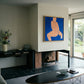 Modern living room with a painting of a nude figure on the wall. Figure in blue – Figurative Abstract Canvas | Premium Wall Art | Brume Art | Luxury Wall Decor | Large Canvas Wall Art | Oversized Wall Hanging-Brume art