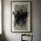 Abstract painting on a wall above a wooden table with a chair and glass. Tension 2 – Bold Abstract Canvas Print | Large Luxury Wall Art | Brume Art