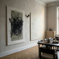 Dining room with abstract art on the wall and a table with chairs. Tension 2 – Bold Abstract Canvas Print | Large Luxury Wall Art | Brume Art