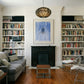 Living room with bookshelves, sofa, and fireplace Portrait of a Man – Contemporary Portrait Canvas | Luxury Wall Art | Brume Art | Luxury Wall Decor | Large Canvas Wall Art | Oversized Wall Hanging-Brume art