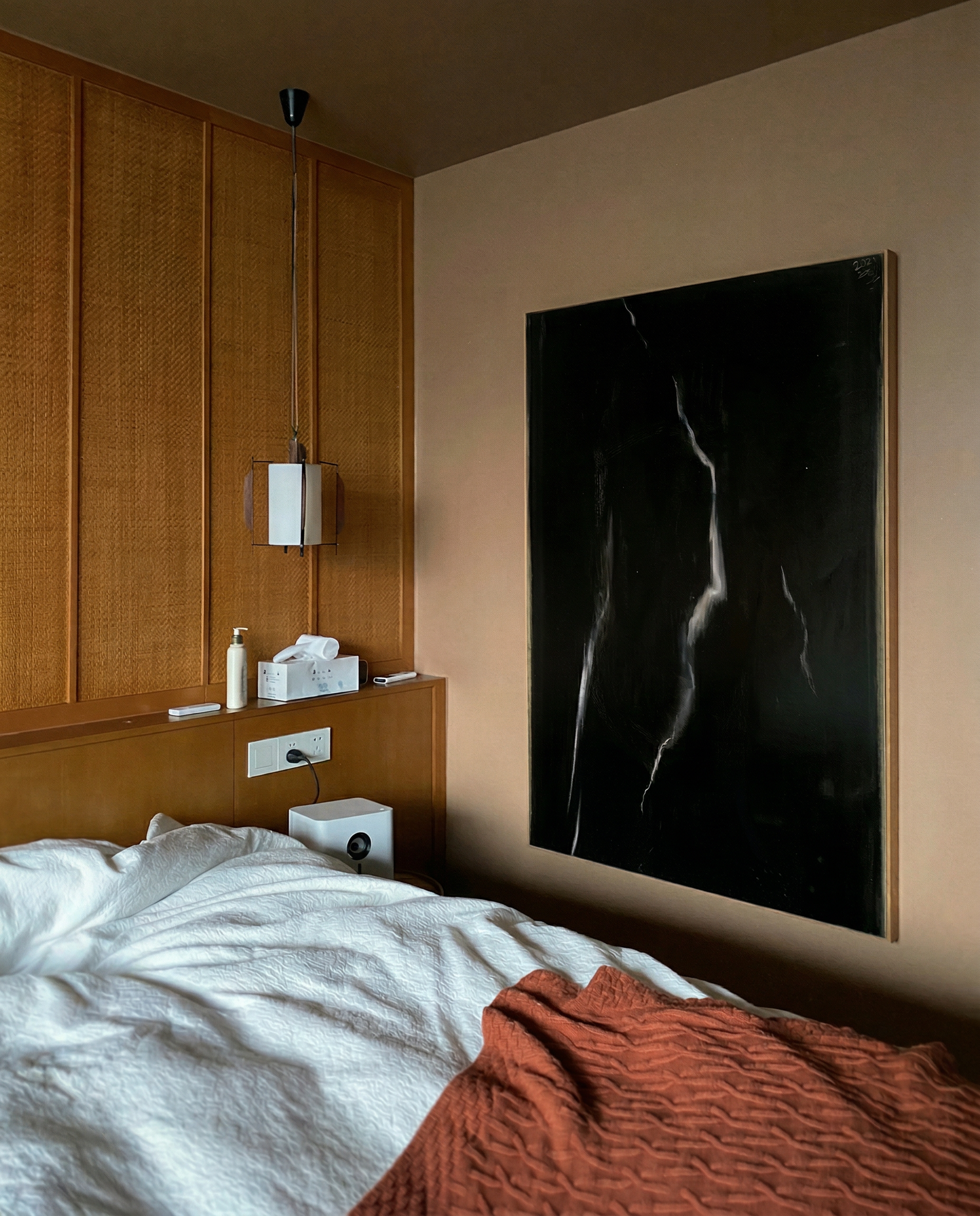 Modern bedroom with wooden headboard, white bedding, and a dark abstract painting. Strike 2 – Bold Abstract Canvas Wall Art | Premium Luxury Print | Brume Art
