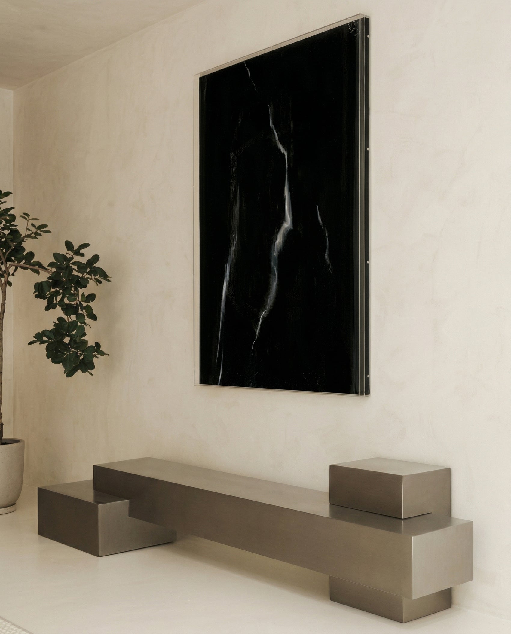 Modern interior with a large black abstract painting on a white wall, a gray bench, and a potted plant. Strike 2 – Bold Abstract Canvas Wall Art | Premium Luxury Print | Brume Art
