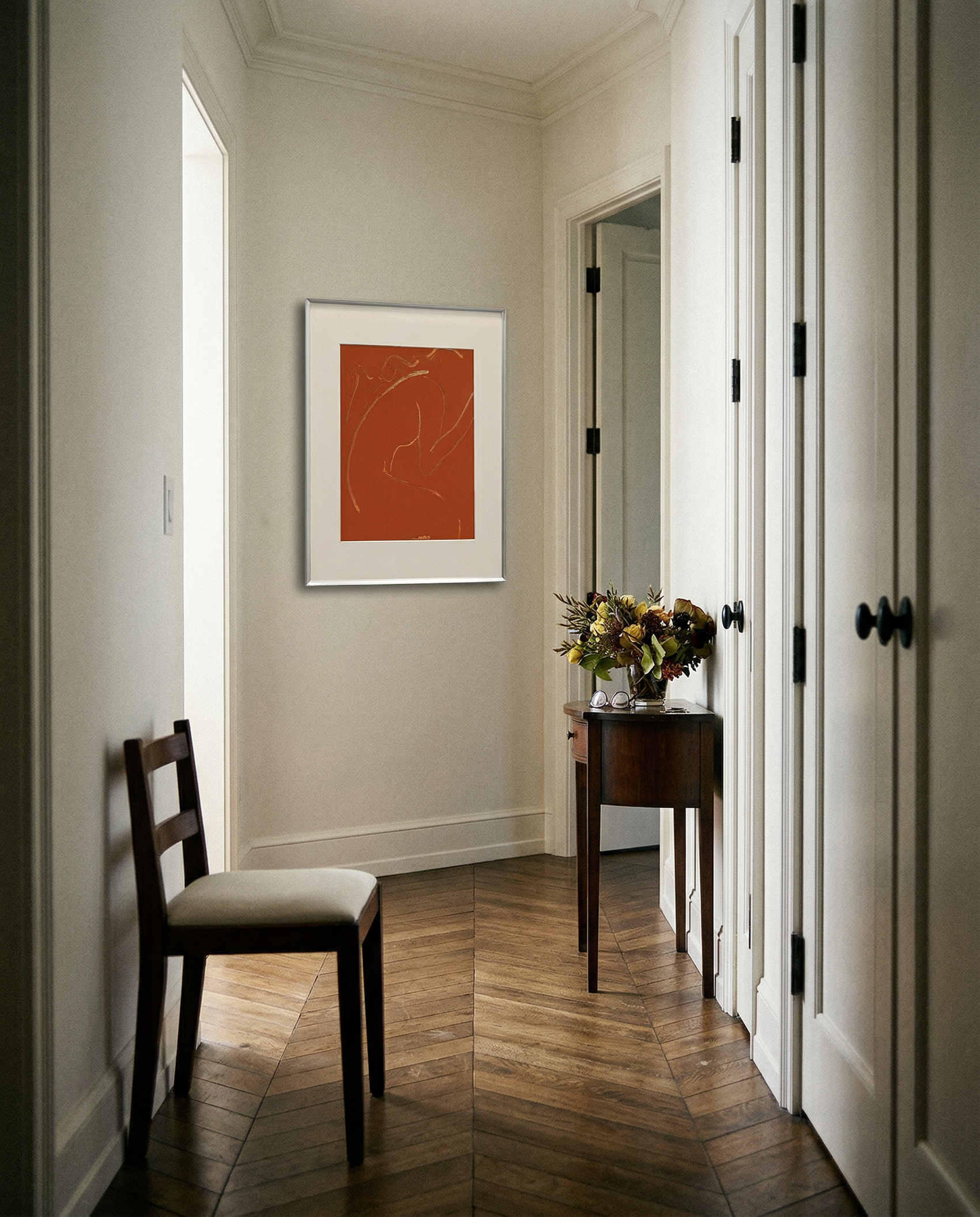 Narrow hallway with a chair, table, and framed artwork on the wall. Presence 2 – Figurative Abstract Canvas | Premium Wall Art | Brume Art