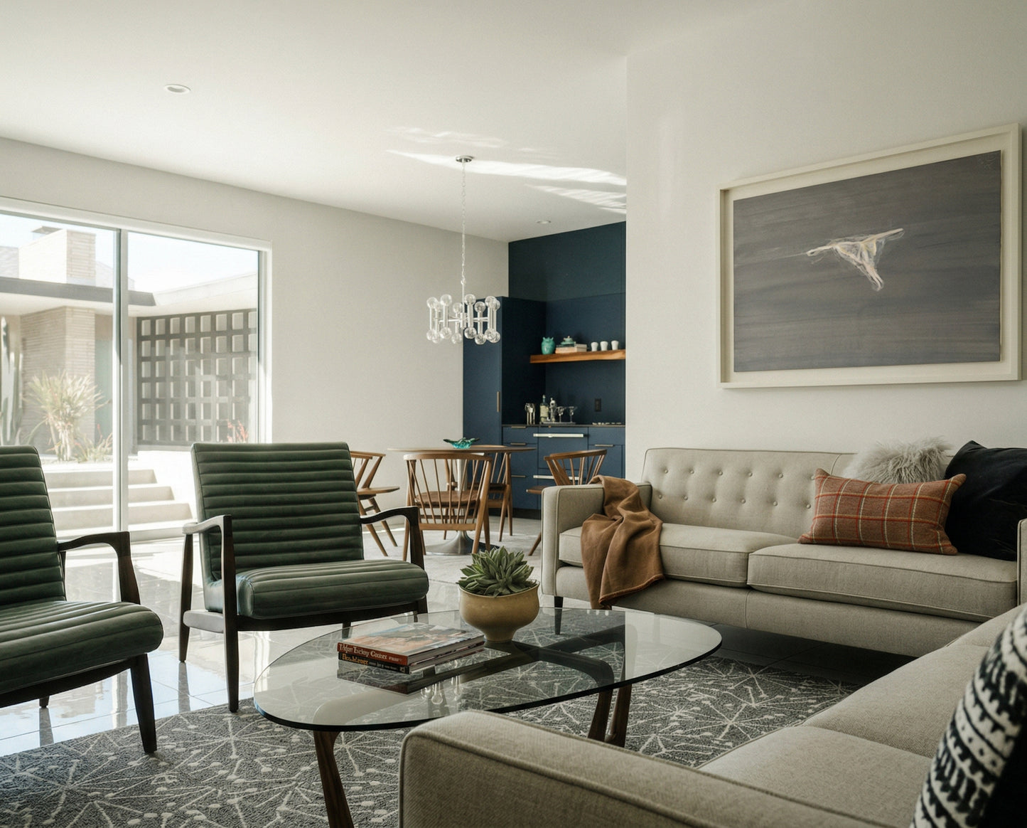 Modern living room with gray sofa, green chairs, and a glass coffee table. Thong - Minimalist Abstract Canvas Art | Large Luxury Wall Print | Brume Art