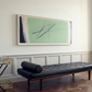 Modern living room with a black leather bench, glass table, and abstract painting on the wall. Big battle - Abstract Diptych Canvas Wall Art | Oversized Luxury Print | Brume Art | Luxury Wall Decor | Large Canvas Wall Art | Oversized Wall Hanging-Brume art