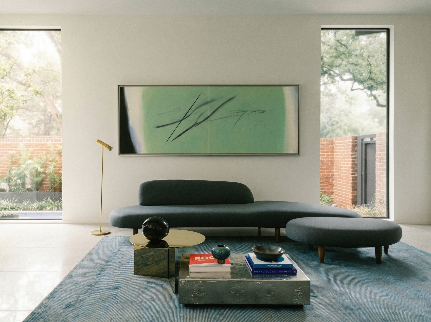 Modern living room with a gray sofa, coffee table, and abstract painting on a white wall. Big battle - Abstract Diptych Canvas Wall Art | Oversized Luxury Print | Brume Art | Luxury Wall Decor | Large Canvas Wall Art | Oversized Wall Hanging-Brume art