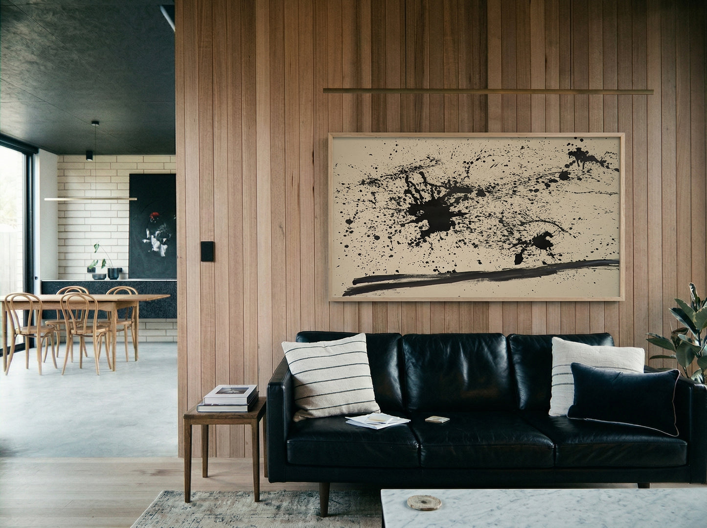 Modern living room with black leather sofa, abstract painting, and wooden wall. Ink – Abstract Ink Canvas Wall Art | Large Premium Print | Brume Art | Luxury Wall Decor | Large Canvas Wall Art | Oversized Wall Hanging-Brume art