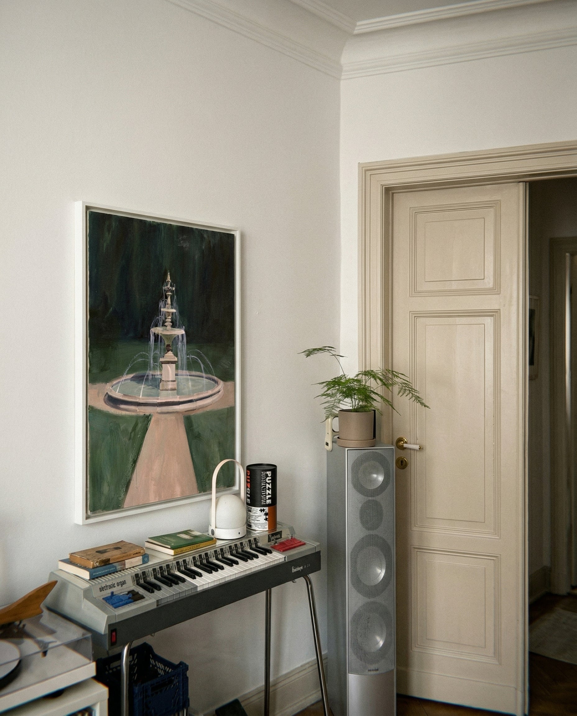 Room interior with a painting, keyboard, and speaker. The Fountain – Abstract Canvas Wall Art | Large Luxury Print | Brume Art| Luxury Wall Decor | Large Canvas Wall Art | Oversized Wall Hanging-Brume art