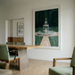 Modern interior with a dining table and chairs, featuring a large framed artwork of a lighthouse. The Fountain – Abstract Canvas Wall Art | Large Luxury Print | Brume Art| Luxury Wall Decor | Large Canvas Wall Art | Oversized Wall Hanging-Brume art