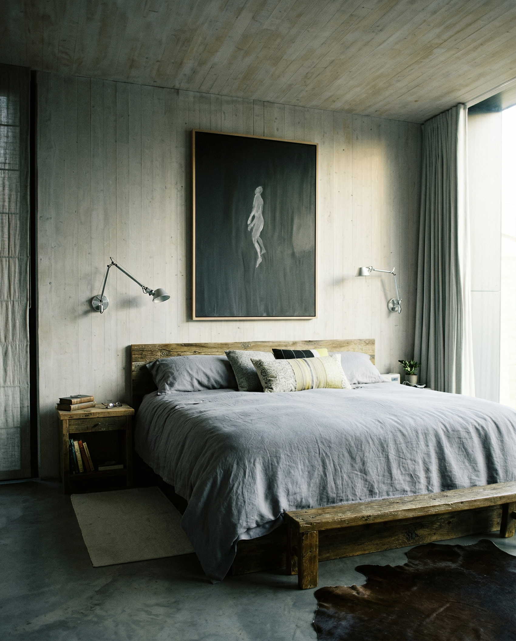 Modern bedroom with wooden bed, gray bedding, and abstract painting on the wall. In the black – Bold Abstract Canvas Wall Art | Large Luxury Print | Brume Art