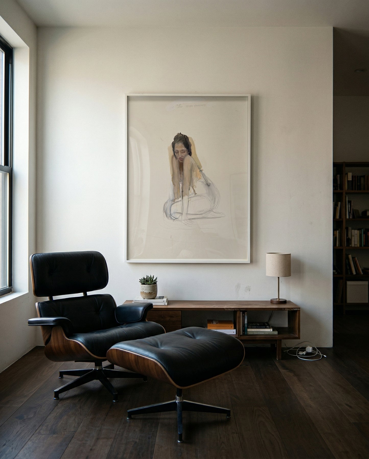 Modern interior with a black Eames chair, desk, and framed artwork on a white wall. Portrait of a lady – Portrait Canvas Wall Art | Large Luxury Print | Brume Art| Luxury Wall Decor | Large Canvas Wall Art | Oversized Wall Hanging-Brume art