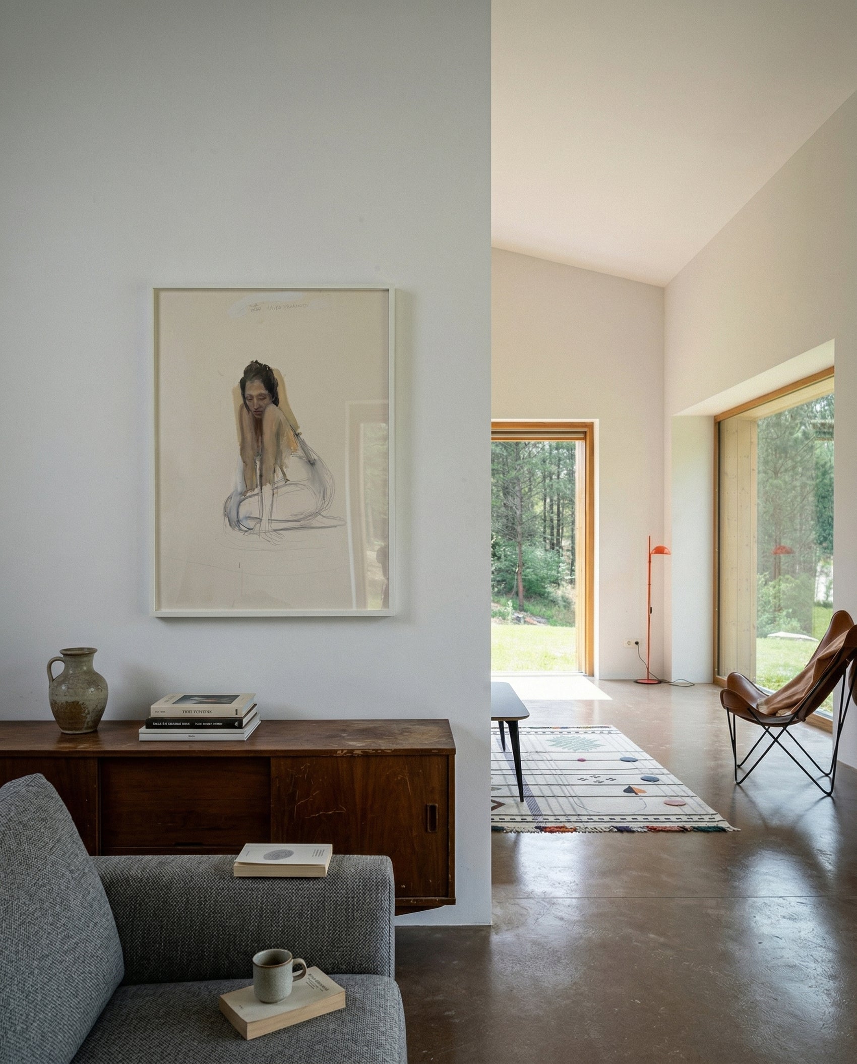 Modern living room with a gray sofa, wooden sideboard, and large windows. Portrait of a lady – Portrait Canvas Wall Art | Large Luxury Print | Brume Art| Luxury Wall Decor | Large Canvas Wall Art | Oversized Wall Hanging-Brume art