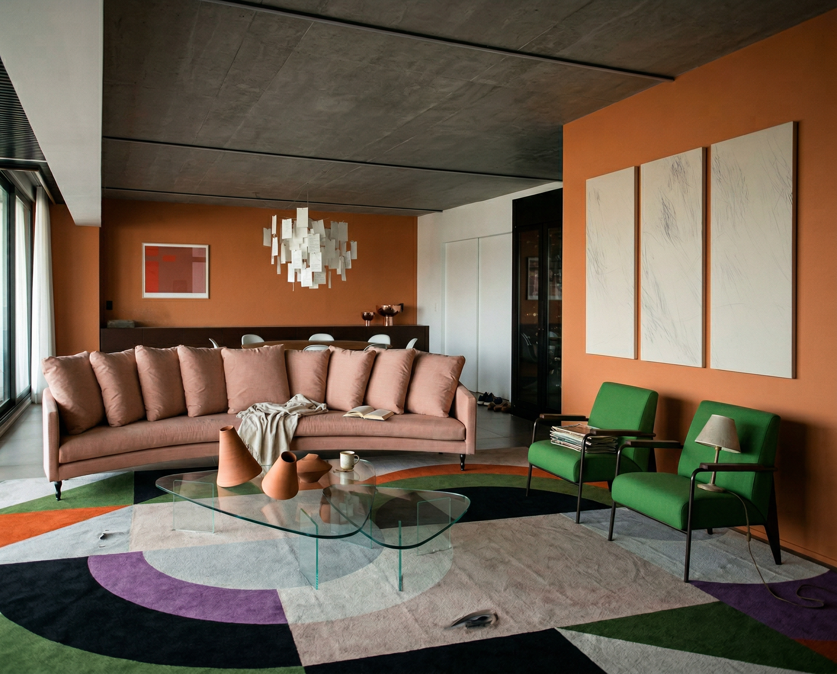 Modern living room with a pink sofa, green chairs, and colorful rug. Black lines 2 – Bold Abstract Canvas Wall Art | Premium Luxury Print | Brume Art| Luxury Wall Decor | Large Canvas Wall Art | Oversized Wall Hanging-Brume art
