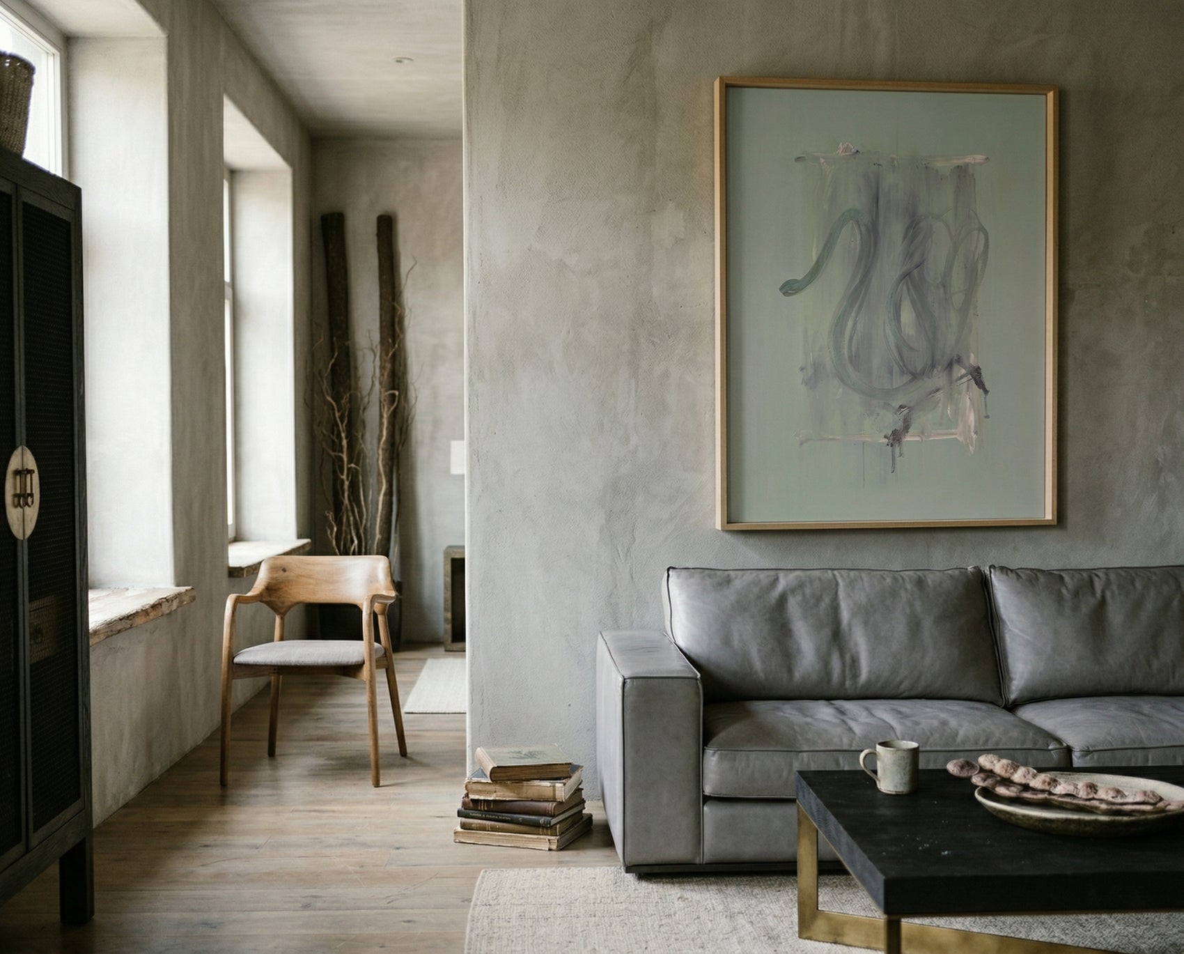 Modern living room with gray sofa, abstract art, and wooden coffee table. tension 3 – Textured Abstract Canvas Art | Premium Luxury Wall Decor | Brume Art