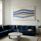 Modern living room with a blue sofa, marble coffee table, and abstract wall art. Blue Stripes – Abstract Diptych Canvas Art | Large Luxury Wall Print | Brume Art