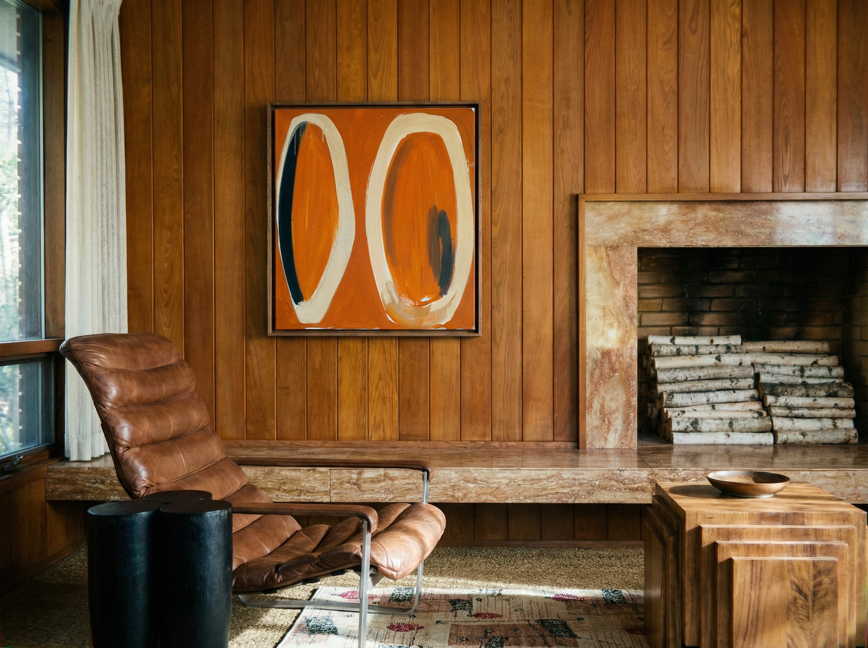 Living room with wooden walls, a leather chair, and abstract art above a fireplace. Form - Bold Abstract Canvas Print | Large Luxury Wall Art | Brume Art | Luxury Wall Decor | Large Canvas Wall Art | Oversized Wall Hanging-Brume art