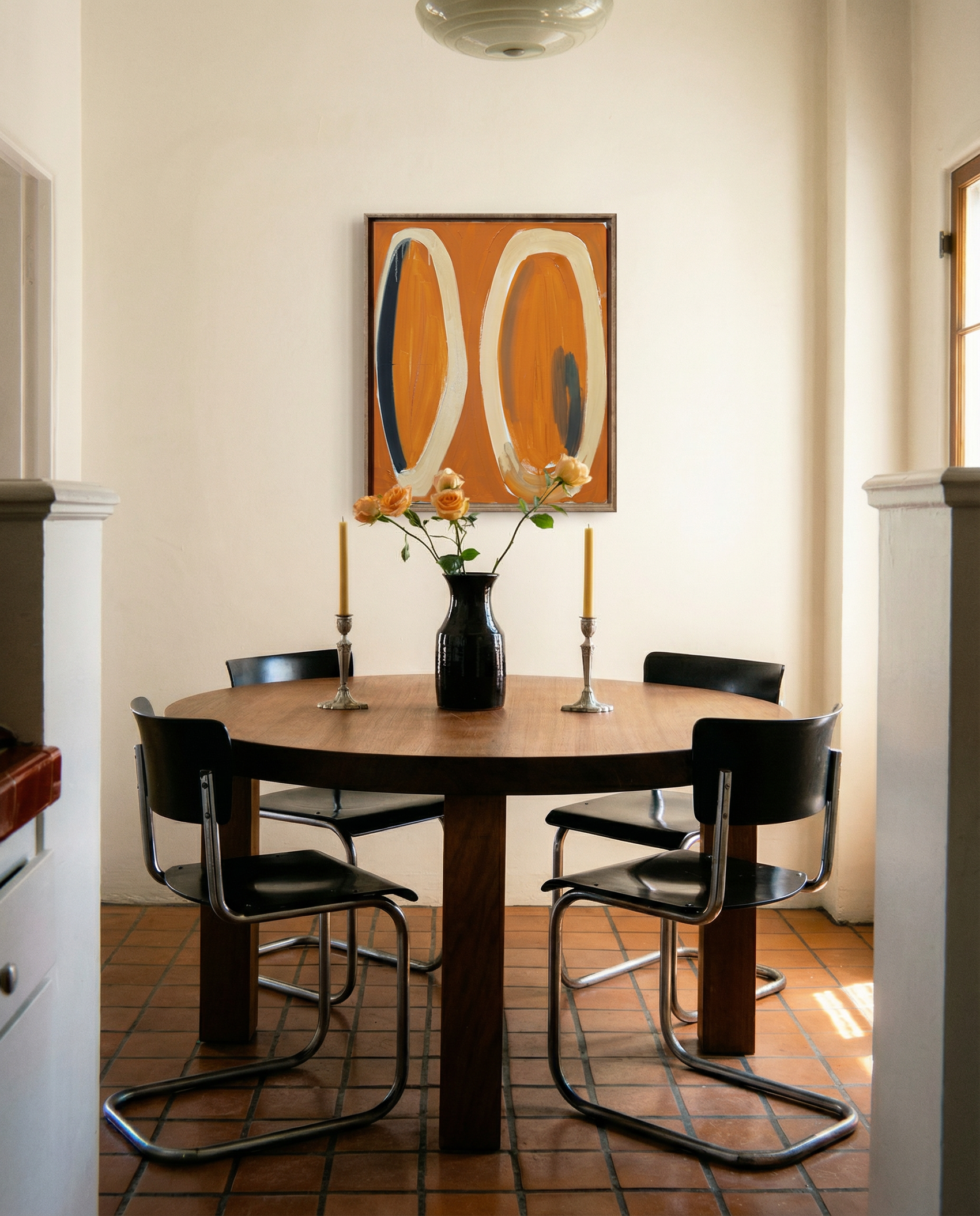 Dining room with a round wooden table and black chairs, featuring a modern abstract painting on the wall. Form - Bold Abstract Canvas Print | Large Luxury Wall Art | Brume Art | Luxury Wall Decor | Large Canvas Wall Art | Oversized Wall Hanging-Brume art