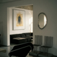 Modern living room with black sofa, abstract art, and unique mirror. Fading figure – Bold Abstract Canvas Print | Large Luxury Wall Art | Brume Art