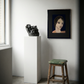 Artistic portrait on a wall next to a sculpture and a stool in a minimalistic room. lady boss – Figurative Canvas Print | Modern Luxury Wall Art | Brume Art | Luxury Wall Decor | Large Canvas Wall Art | Oversized Wall Hanging-Brume art