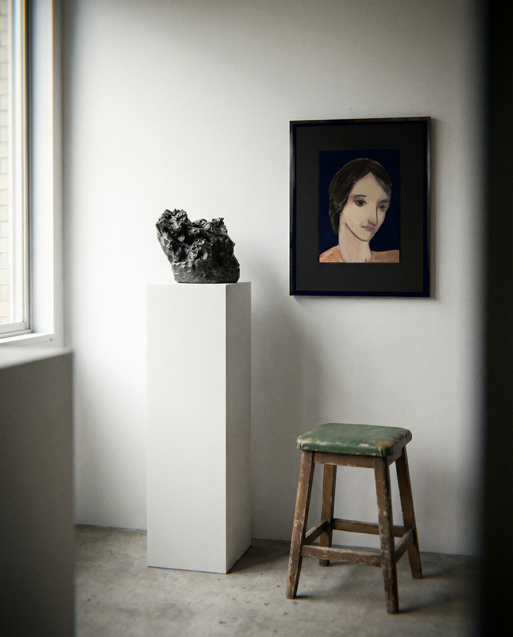 Artistic portrait on a wall next to a sculpture and a stool in a minimalistic room. lady boss – Figurative Canvas Print | Modern Luxury Wall Art | Brume Art | Luxury Wall Decor | Large Canvas Wall Art | Oversized Wall Hanging-Brume art
