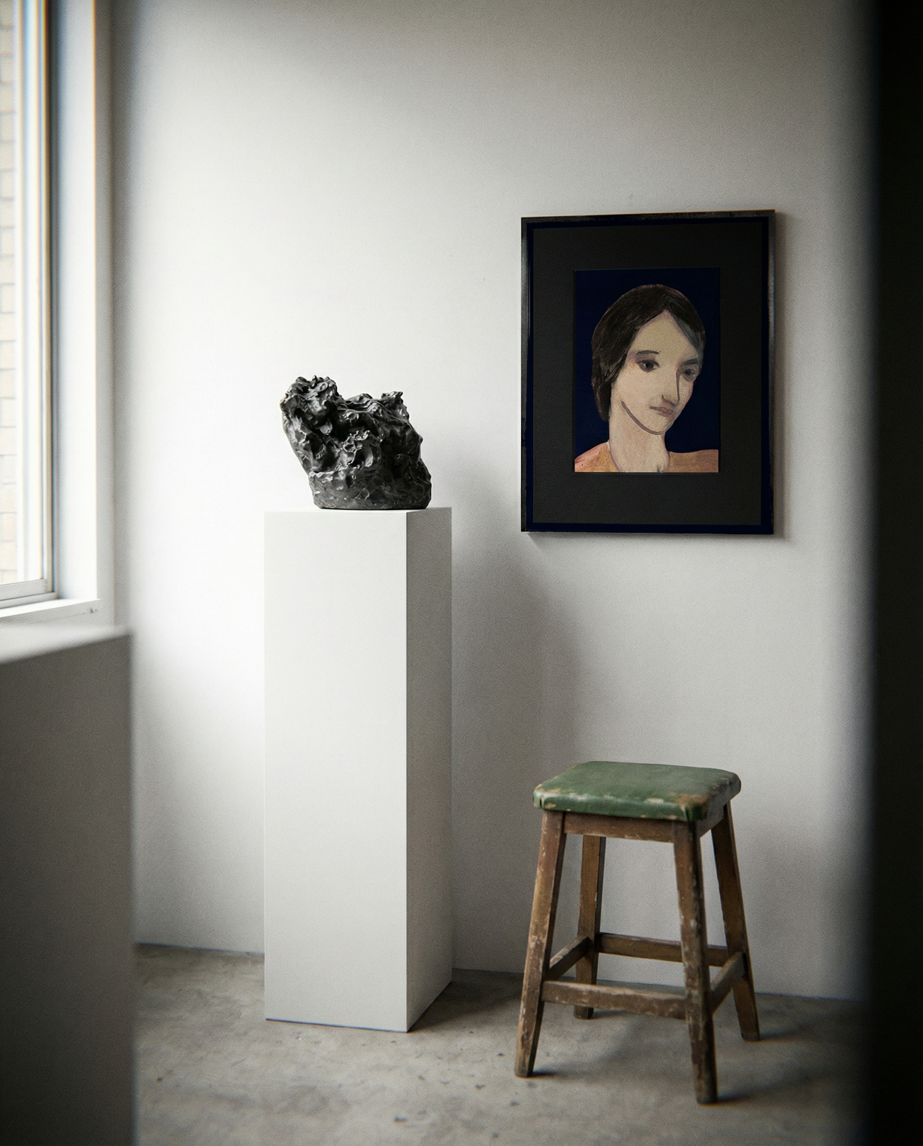 Artistic portrait on a wall next to a sculpture and a stool in a minimalistic room. lady boss – Figurative Canvas Print | Modern Luxury Wall Art | Brume Art | Luxury Wall Decor | Large Canvas Wall Art | Oversized Wall Hanging-Brume art