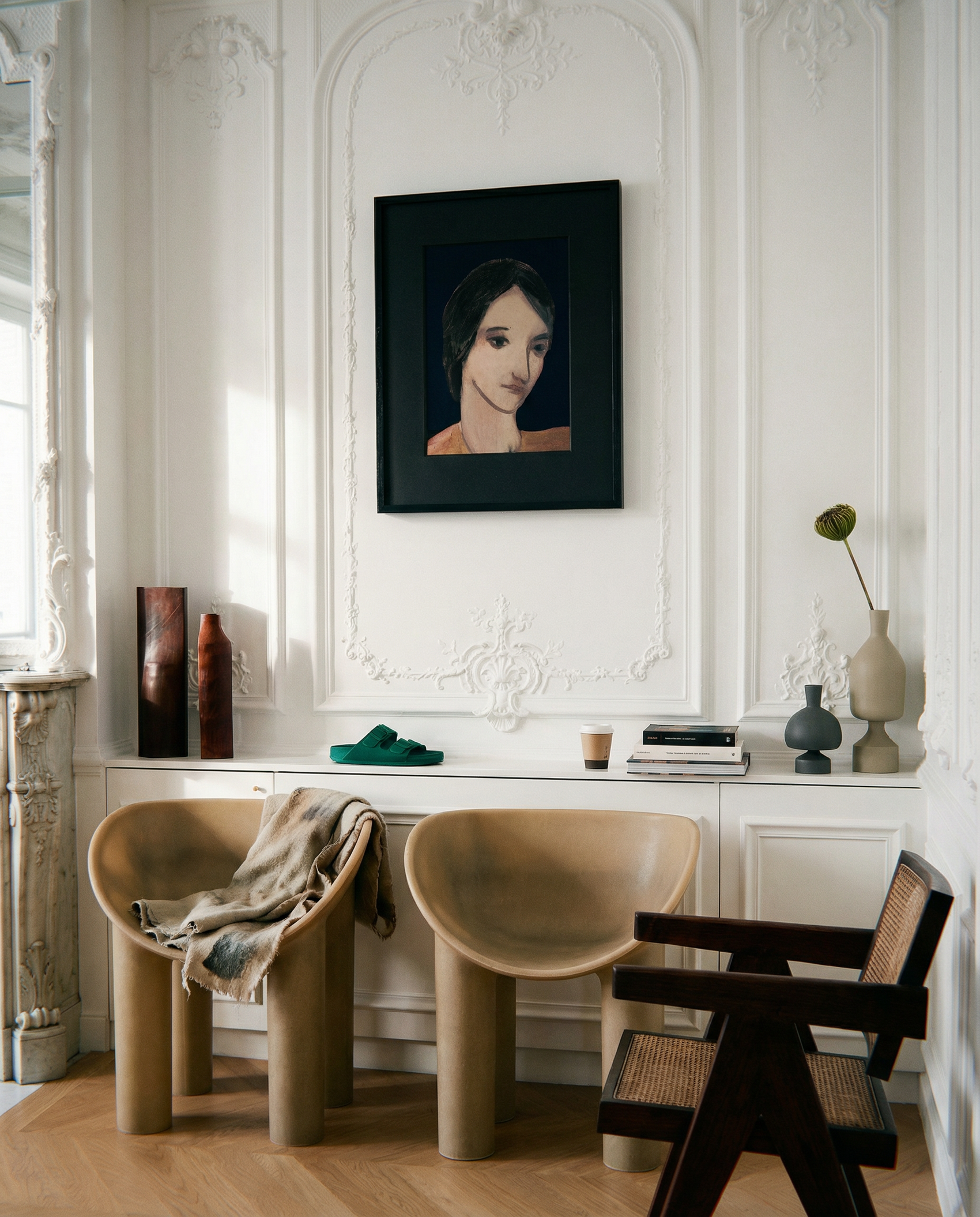 Modern interior with beige chairs, a dark wooden chair, and a framed portrait on a white wall. lady boss – Figurative Canvas Print | Modern Luxury Wall Art | Brume Art | Luxury Wall Decor | Large Canvas Wall Art | Oversized Wall Hanging-Brume art