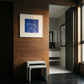 Modern interior with wooden wall, framed artwork, and white furniture. Presence 4 – Figurative Abstract Canvas Print | Large Luxury Wall Art | Brume Art