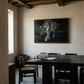 Dining room with a large painting on the wall above a wooden table and chairs. Tiger 2 – Contemporary Animal Canvas Art | Luxury Wall Decor | Brume Art | Luxury Wall Decor | Large Canvas Wall Art | Oversized Wall Hanging-Brume art