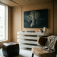 Modern interior with a marble console table, chair, and artwork on a wooden wall. Tiger 2 – Contemporary Animal Canvas Art | Luxury Wall Decor | Brume Art | Luxury Wall Decor | Large Canvas Wall Art | Oversized Wall Hanging-Brume art