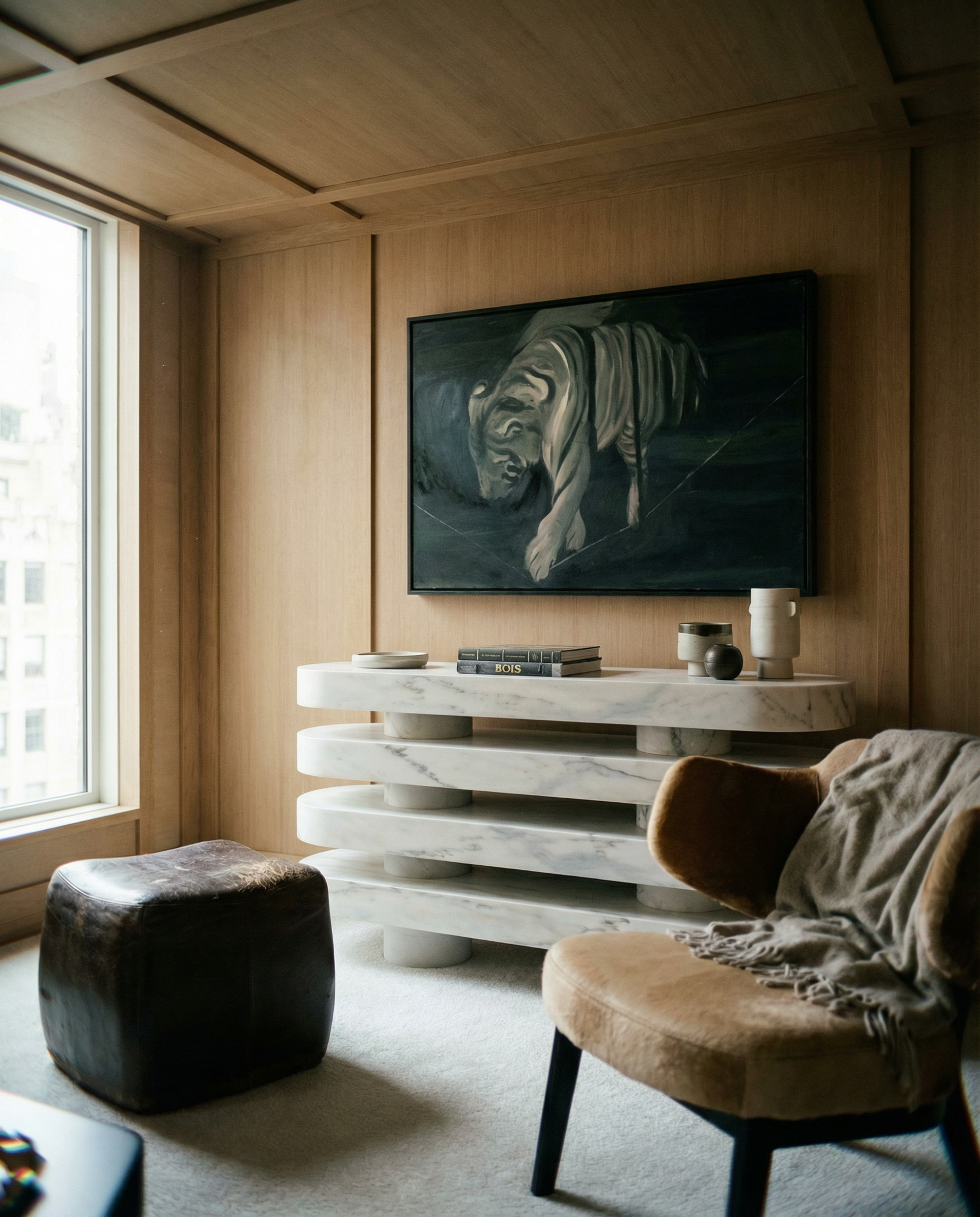 Modern interior with a marble console table, chair, and artwork on a wooden wall. Tiger 2 – Contemporary Animal Canvas Art | Luxury Wall Decor | Brume Art | Luxury Wall Decor | Large Canvas Wall Art | Oversized Wall Hanging-Brume art
