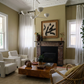Living room with fireplace, chairs, and a coffee table. Ink 3 – Abstract Ink Canvas Wall Art | Oversized Luxury Print | Brume Art | Luxury Wall Decor | Large Canvas Wall Art | Oversized Wall Hanging-Brume art