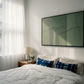 Modern bedroom with a bed, nightstand, and abstract painting on the wall. olive – Bold Abstract Canvas Print | Large Luxury Wall Art | Brume Art