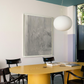 Modern office interior with a yellow conference table, black chairs, and a large abstract painting on the wall. Fade – Bold Abstract Canvas Wall Art | Large Luxury Print | Brume Art