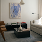 Modern living room with abstract art, coffee table, and sofa. Veil – Contemporary Abstract Canvas | Oversized Luxury Wall Art | Brume Art | Luxury Wall Decor | Large Canvas Wall Art | Oversized Wall Hanging-Brume art
