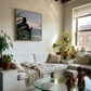 Cozy living room with a white sofa, glass coffee table, and decorative elements. Tycoon – Figurative Canvas Wall Art | Premium Luxury Print | Brume Art| Luxury Wall Decor | Large Canvas Wall Art | Oversized Wall Hanging-Brume art