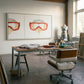 Home office with a desk, chair, and artwork on the wall. Diving Mask – Unique Figurative Canvas Art | Premium Wall Decor | Brume Art | Luxury Wall Decor | Large Canvas Wall Art | Oversized Wall Hanging-Brume art