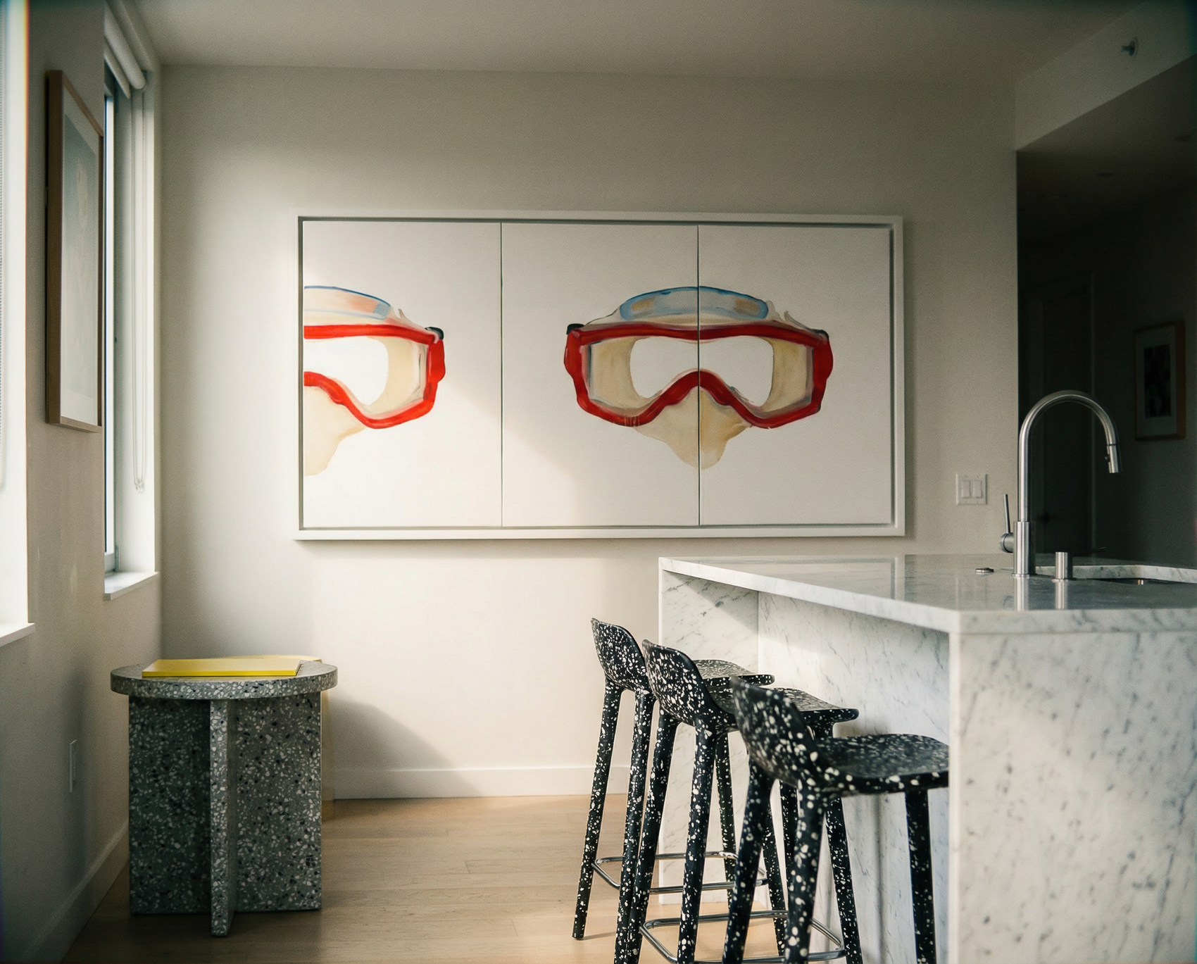 Modern kitchen with a large abstract painting of goggles on the wall. Diving Mask – Unique Figurative Canvas Art | Premium Wall Decor | Brume Art | Luxury Wall Decor | Large Canvas Wall Art | Oversized Wall Hanging-Brume art