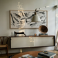 Modern interior with abstract art, console table, and books on a coffee table. Ink 2 – Abstract Ink Canvas Wall Art | Oversized Luxury Print | Brume Art
