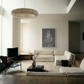Modern living room with a sectional sofa, coffee table, and decorative items. Still 2 – Serene Abstract Canvas Print | Premium Luxury Wall Art | Brume Art