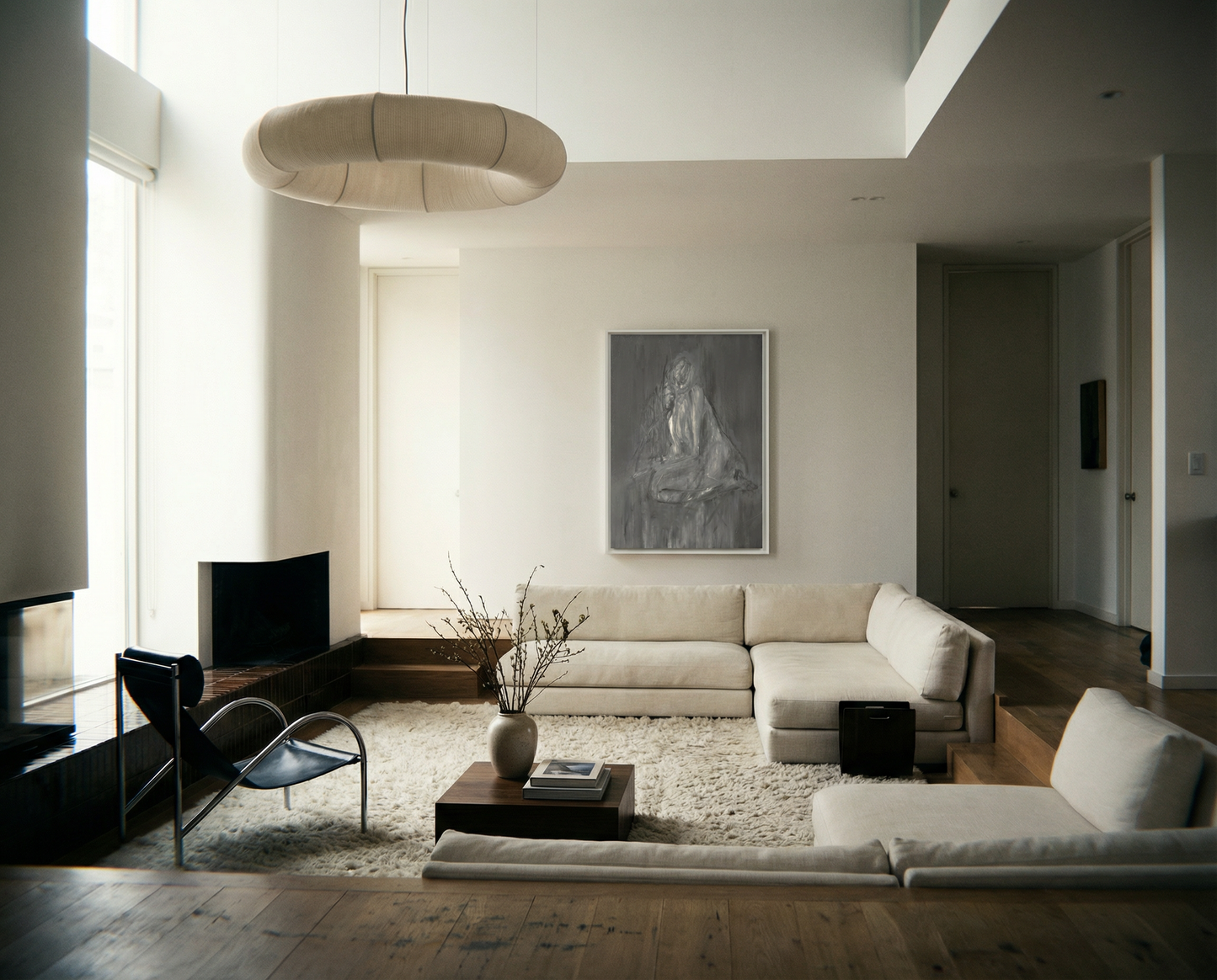 Modern living room with a sectional sofa, coffee table, and decorative items. Still 2 – Serene Abstract Canvas Print | Premium Luxury Wall Art | Brume Art