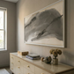 Beige dresser with decorative items against a wall with a large abstract painting. Fade 3 – Minimalist Abstract Canvas Art | Large Luxury Wall Print | Brume Art | Luxury Wall Decor | Large Canvas Wall Art | Oversized Wall Hanging-Brume art