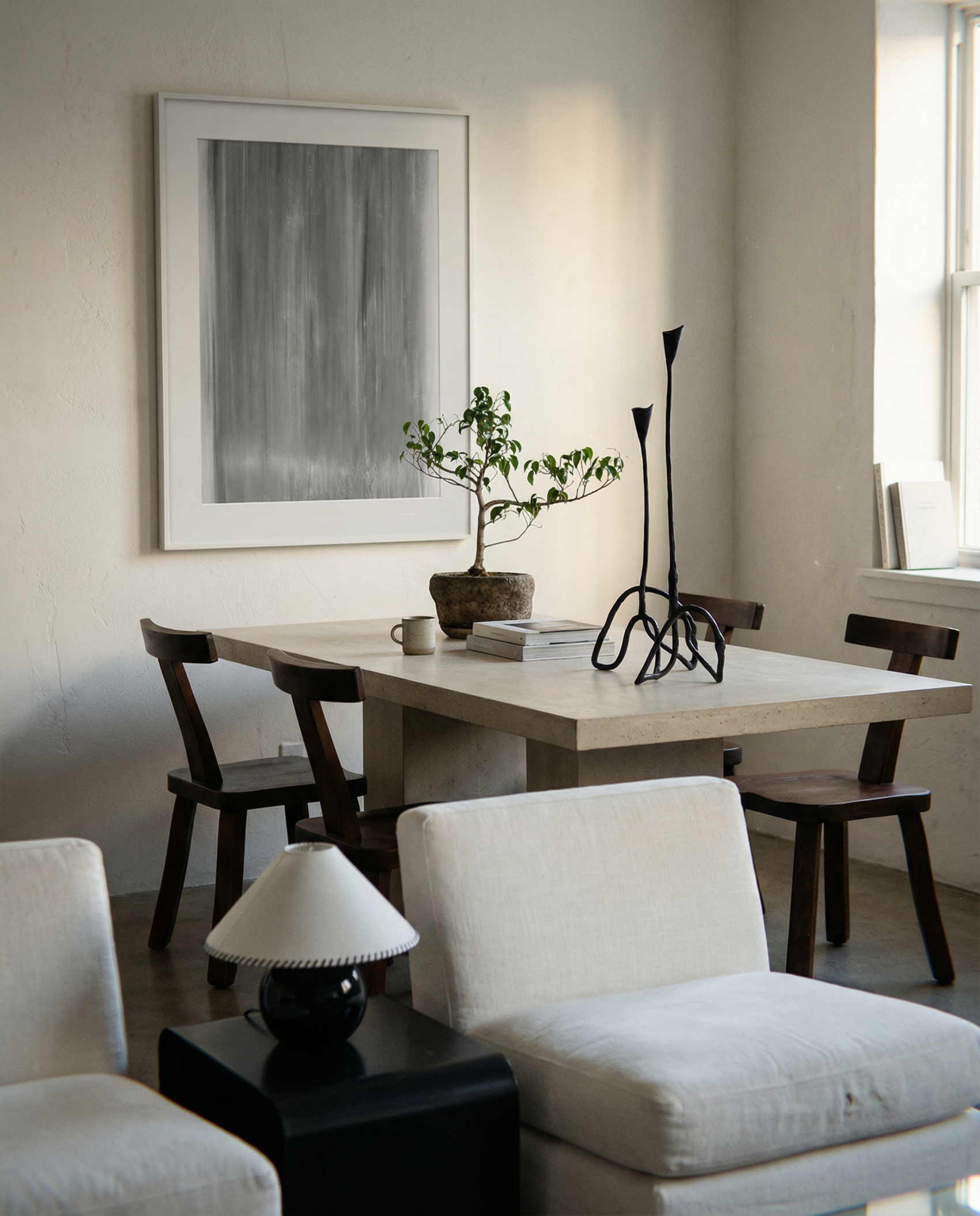 Modern dining room with a table, chairs, and decorative items. fade 2 – Minimalist Abstract Canvas Art | Large Luxury Wall Print | Brume Art | Luxury Wall Decor | Large Canvas Wall Art | Oversized Wall Hanging-Brume art