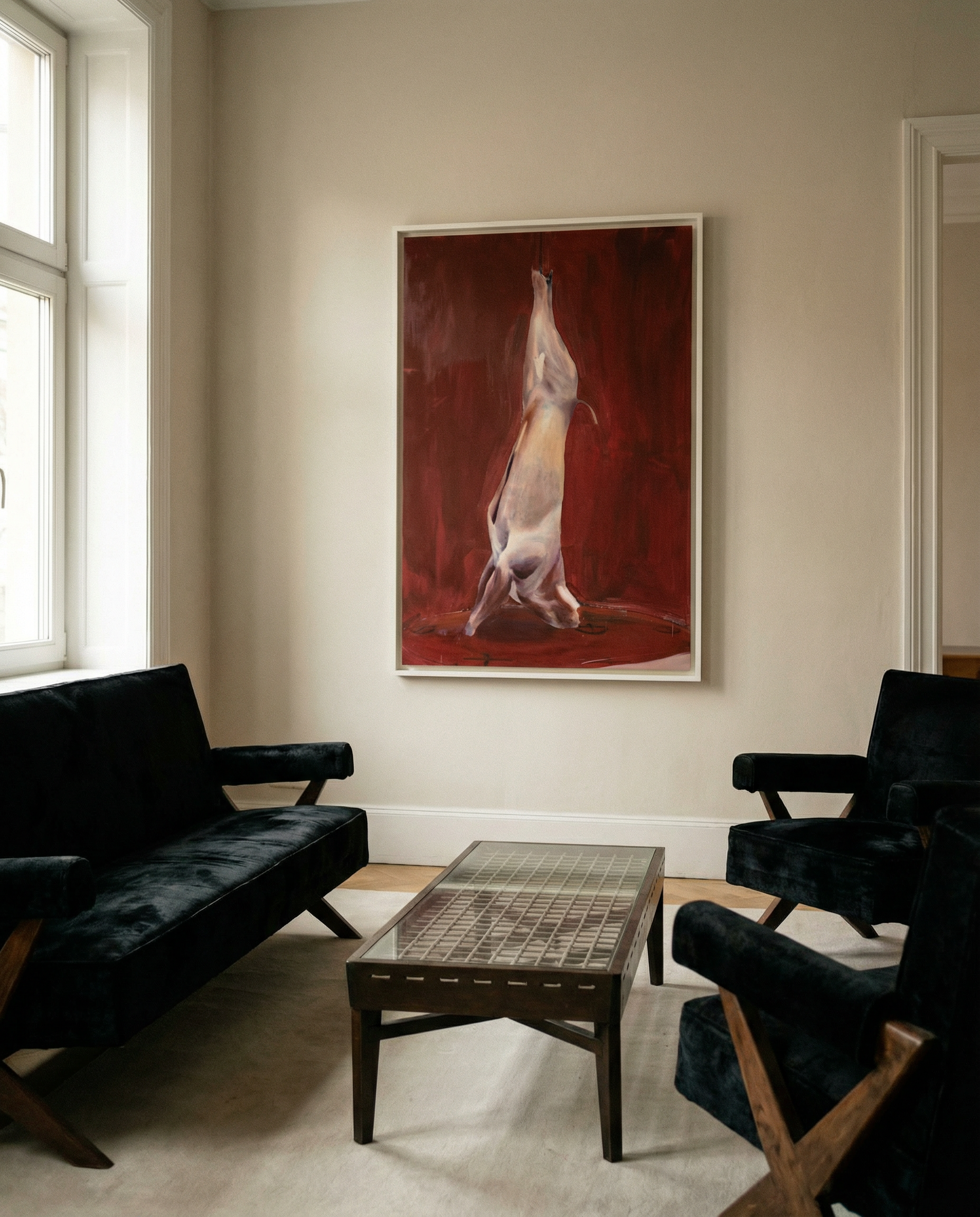 Living room with black sofa, coffee table, and a large painting of a dog on a red background. Painting of a dog standing on its hind legs against a red background Suspension – Nature Canvas Wall Art | Large Luxury Print | Brume Art